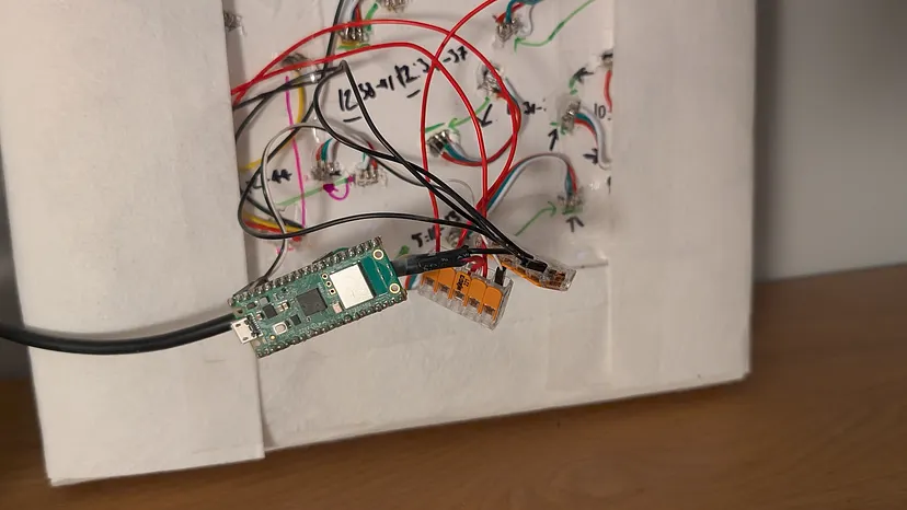 Raspberry Pi Pico W connected host the Python files and controls the lights
