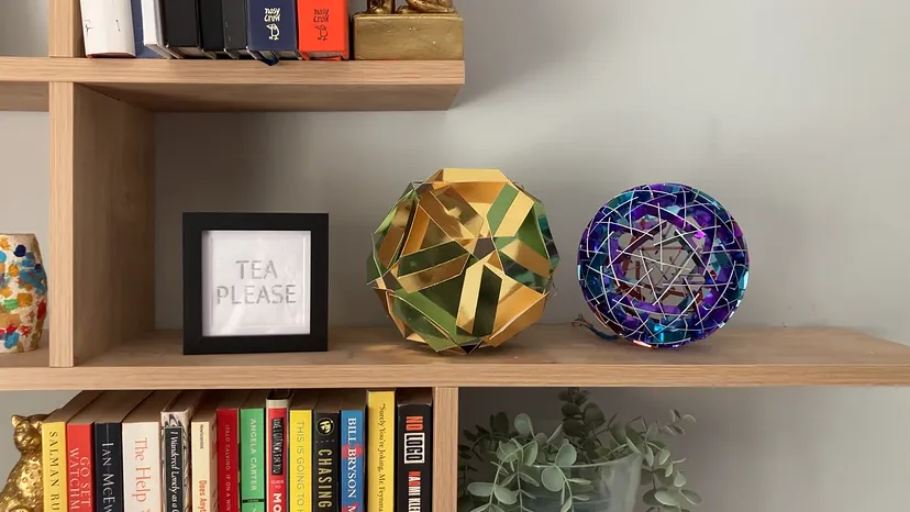 Tea Please and Rotegrity Beacons share a string of 24 LEDs on a shelf