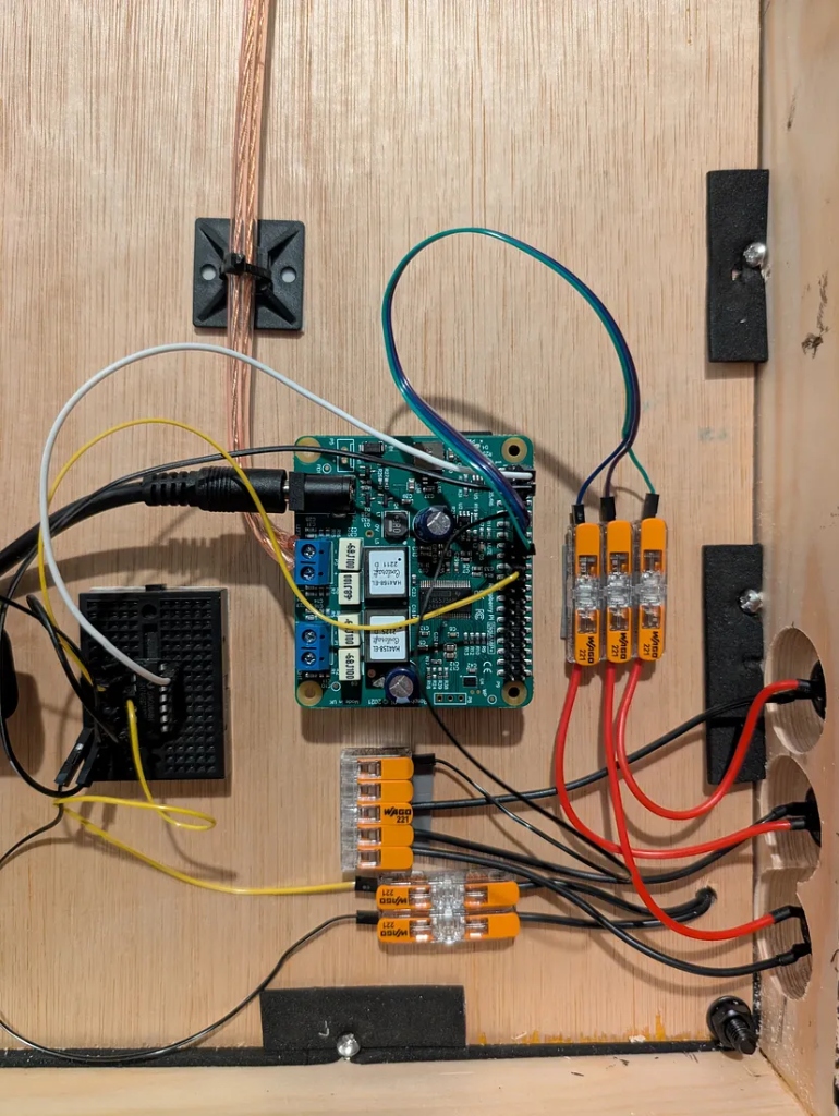 The DigiAmp+ amplifier HAT sits on top of a Raspberry Pi Zero 2W