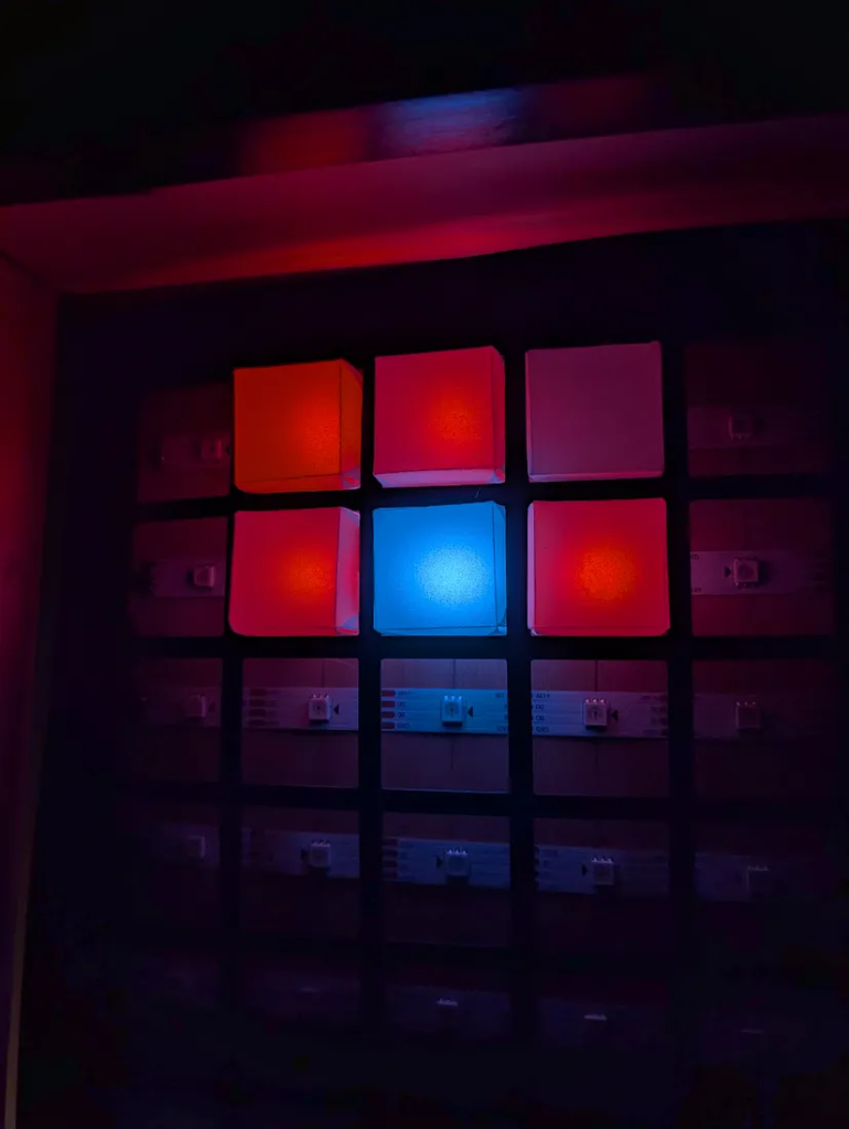 One open bottomed cube sits above each WS2815 LED